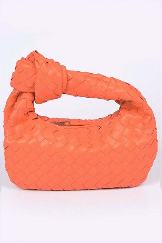 braided top knot clutch bag orange