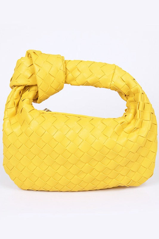 braided top knot clutch bag yellow